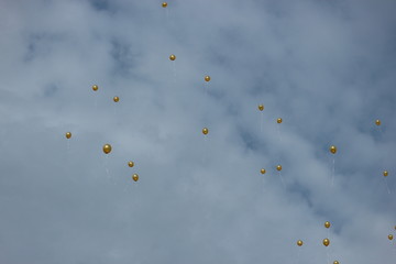 Golden baloons in the sky