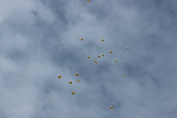 Golden baloons in the sky