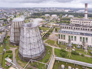 steam coming from cooling towers of thermal power station. aerial top view