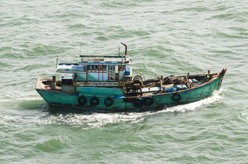Naklejka na ściany i meble The Vietnamese fishing boat in the high sea