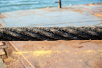 Close up iron chains show circle loops with coast on background. image for background, objects, copy space article and illustration.