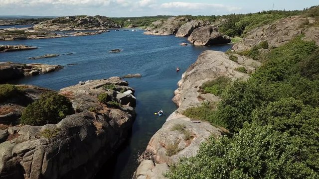Aerial coastline scene - padling along the shore -Drone Stock