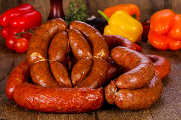 Pork sausages over wooden