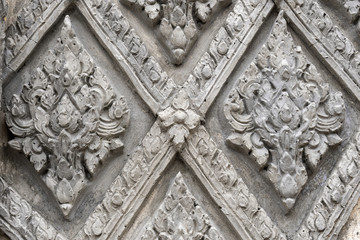 Thai style stucco on the wall and temple wall