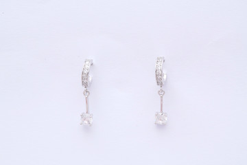 Fashion earring on white background