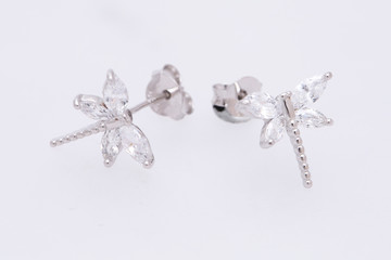 Fashion earring on white background