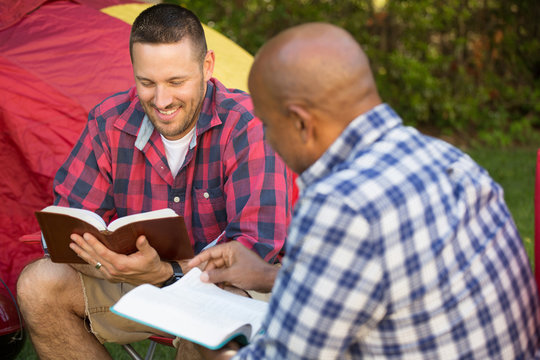 Men having a bible study.