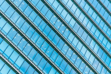 Beautiful architecture office building skyscraper with window glass pattern