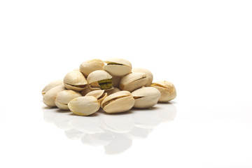 Heap of salted pistachio nuts