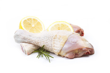 Raw chicken legs on white background isolated