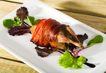 Wrapped in bacon baked quail