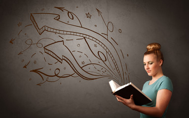 Casual young woman holding book with brown arrows and stars flying out of it