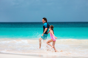 Father and daughter at beach