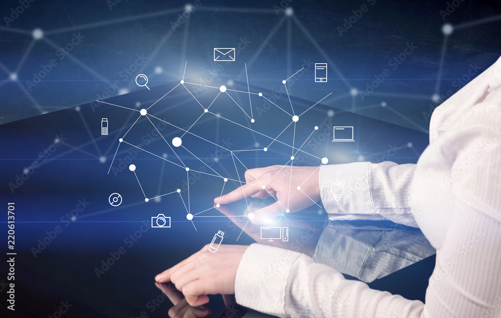 Poster male hands touching interactive table with blue mixed communication icons in the background