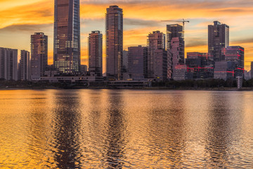 urban skyline and modern buildings at dusk, cityscape of China.