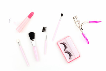 Cosmetics set for women on white background.