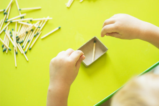 A Small Child Plays With Matches, Matches Matches Into Boxes, Close-ups, Fire, Lucifer Match, Hand