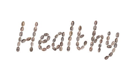 The word Healthy written with chia seeds and isolated on white background