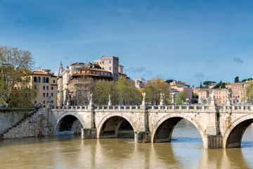 Fototapeta na wymiar Rome downtown skyline with bridge on river Tiber at sunny day in Rome, Italy.