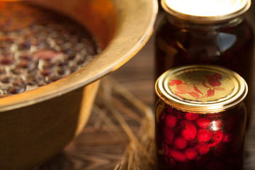 Obraz na płótnie Canvas Cooking cherry jam. Homemade organic sour cherries preserve.