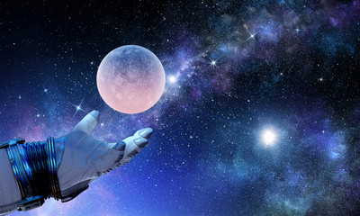 Fototapeta na wymiar Moon planet in spaceman hand. Mixed media