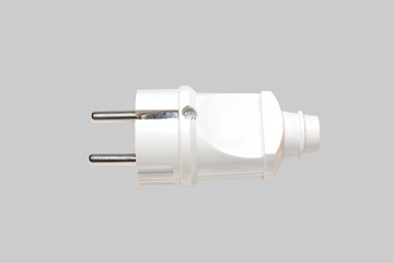 Electric plug isolated on gray background