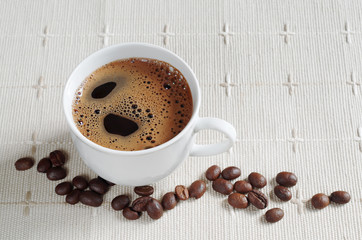 Cup of coffee and beans