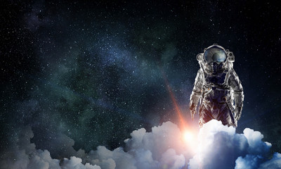 Obraz na płótnie Canvas Astronaut and his mission. Mixed media