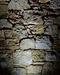 illuminated stone wall background, space for typing