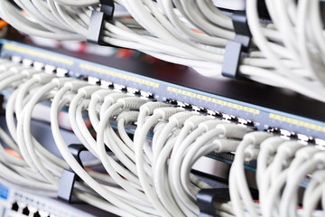 Gigabit network switch and perfect aligned patch cables in datacenter