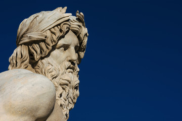 Greek or Roman God. Marble head of River Ganges statue from baroque Fountain of Four River, erected in the 17th century in the historic center of Rome (with copy space) © crisfotolux