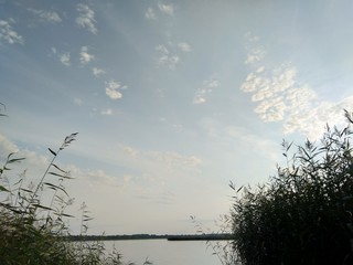 Sunny Sky Above A Lake