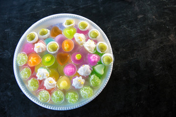 Colorful Thai desserts made from ingredients,  powder, soybean and sugar. local dessert for traditional ceremony.
