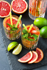 Summer   citrus cold drink (juice,  lemonade, cocktail) with  mint