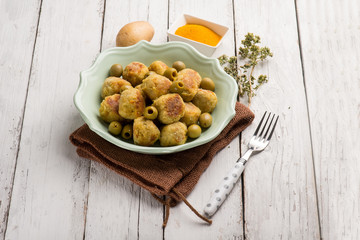 vegetarian meatballs with potatoes tumeric and green olives
