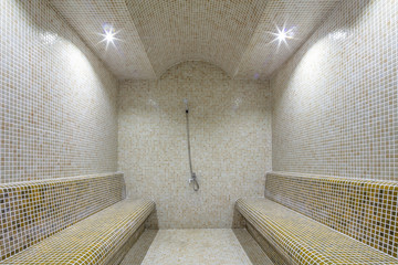 Large steam room with health spa at a luxury hotel