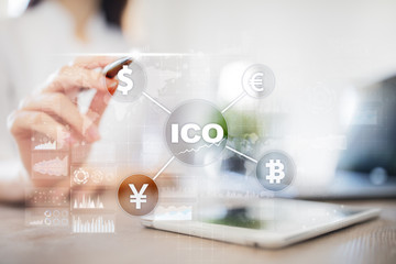 ICO, Initial Coin Offering. Digital electronic binary money financial concept. Bitcoin currency exchange on virtual screen interface.