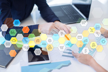 Colored applications icons and graphs on virtual screen. Business, internet and technology concept.