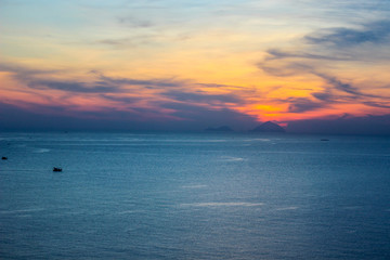 Obraz premium Island Ocean Magical Sunset Asia Vacation Travel Sight Red Orange Purple
