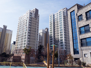 The playground for children and big buildings in rich area of Yeosu city. South Korea 2018
