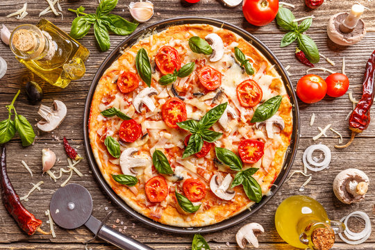 Flat lay with Italian pizza