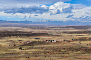 Fototapeta na wymiar Panoramic view across the altiplano and the mountains of the Cordillera Real, near La Paz, Bolivia