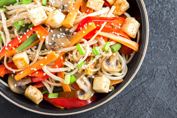Stir fry with noodles, tofu and vegetables