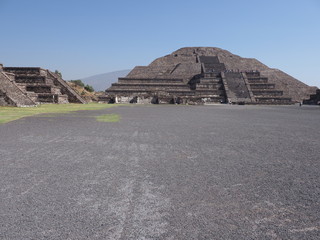 Monumental pyramid of the Moon at Teotihuacan ruins seen from Avenue of the Dead near Mexico city landscape