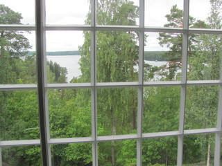 View from the window to the lake and the forest