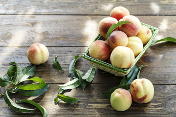 Peach crop on a wooden background