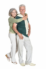 Portrait of a senior couple embracing isolated