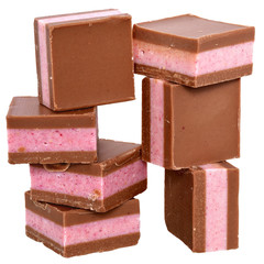 Dark chocolate cubes with fruit berry cream filling isolated