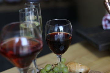 Wine, croissant, cheese.