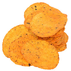 Heap of corn chips with spices close-up isolated